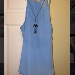 Blue dressy tank top with necklace. Necklace is removable